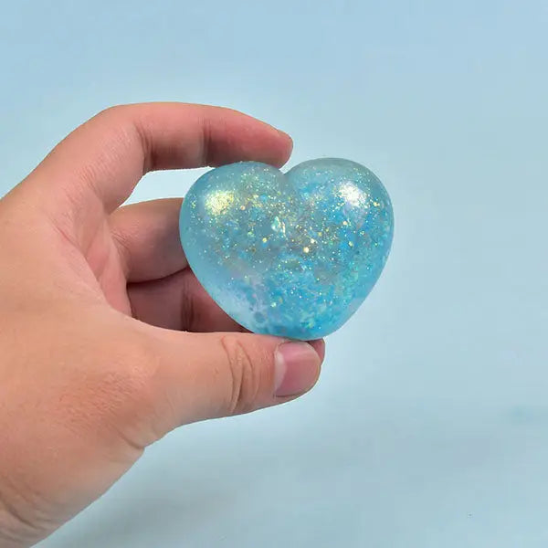 SugarSqueez Squishies® Glitter Heart Maltose Fidget Stress Ball Assorted Colors